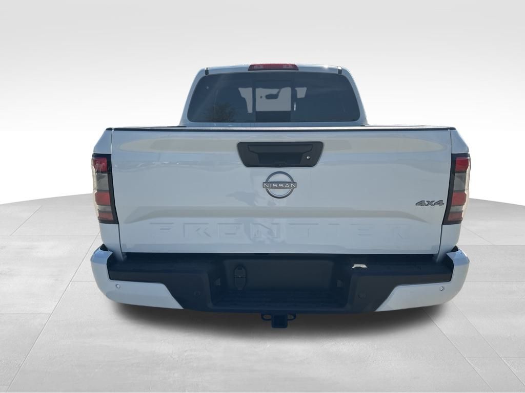 2025 Glacier White Nissan Frontier SV 4X4 Truck