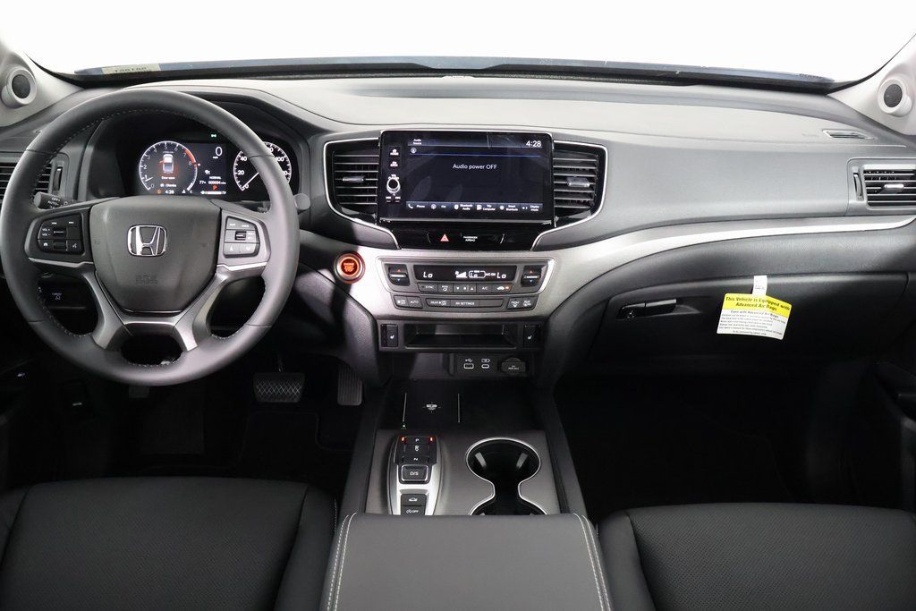 View vehicle photo 4