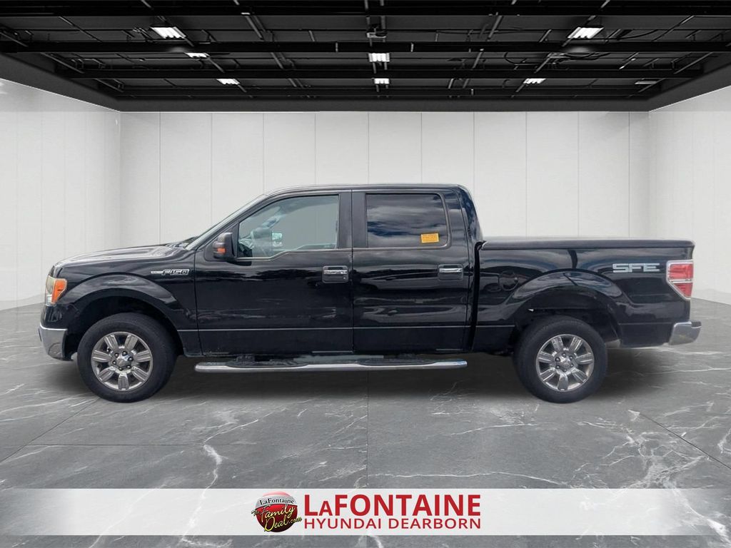 Used 2009 Ford F-150 XLT with VIN 1FTRW128X9FA42846 for sale in Dearborn, MI