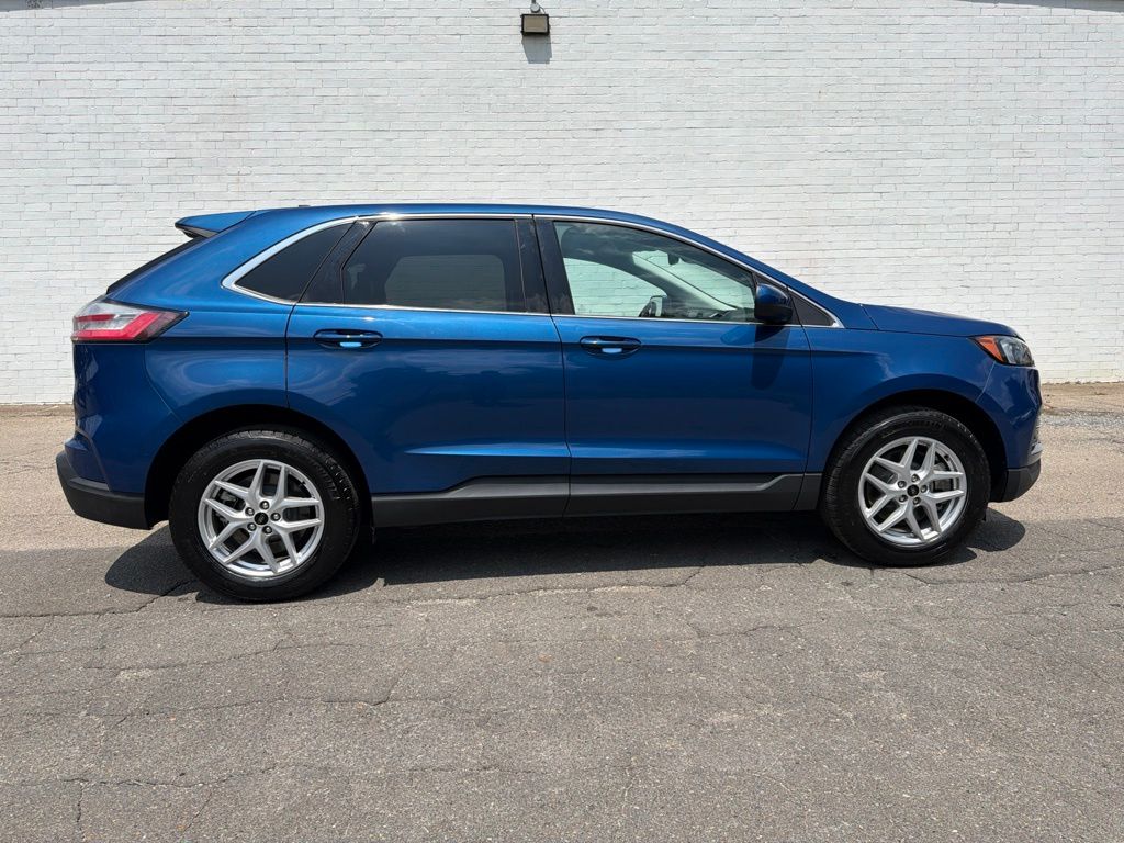 Blue Metallic 2024 Ford Edge SUV / Crossover All-Wheel Drive 8-Speed Automatic
