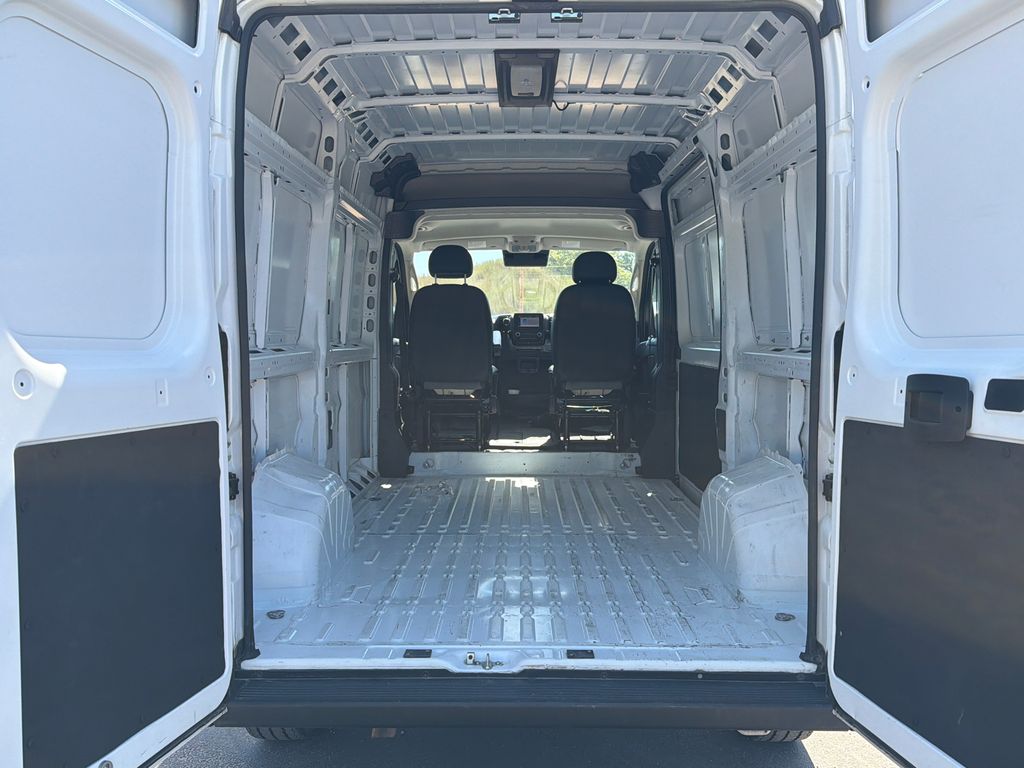 Used 2025 Bright White Clearcoat Ram High Roof image 17