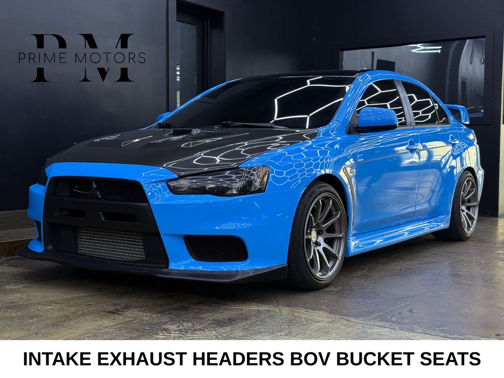 Blue / Black 2013 Mitsubishi Lancer Evolution Sedan All-Wheel Drive 5-Speed Manual