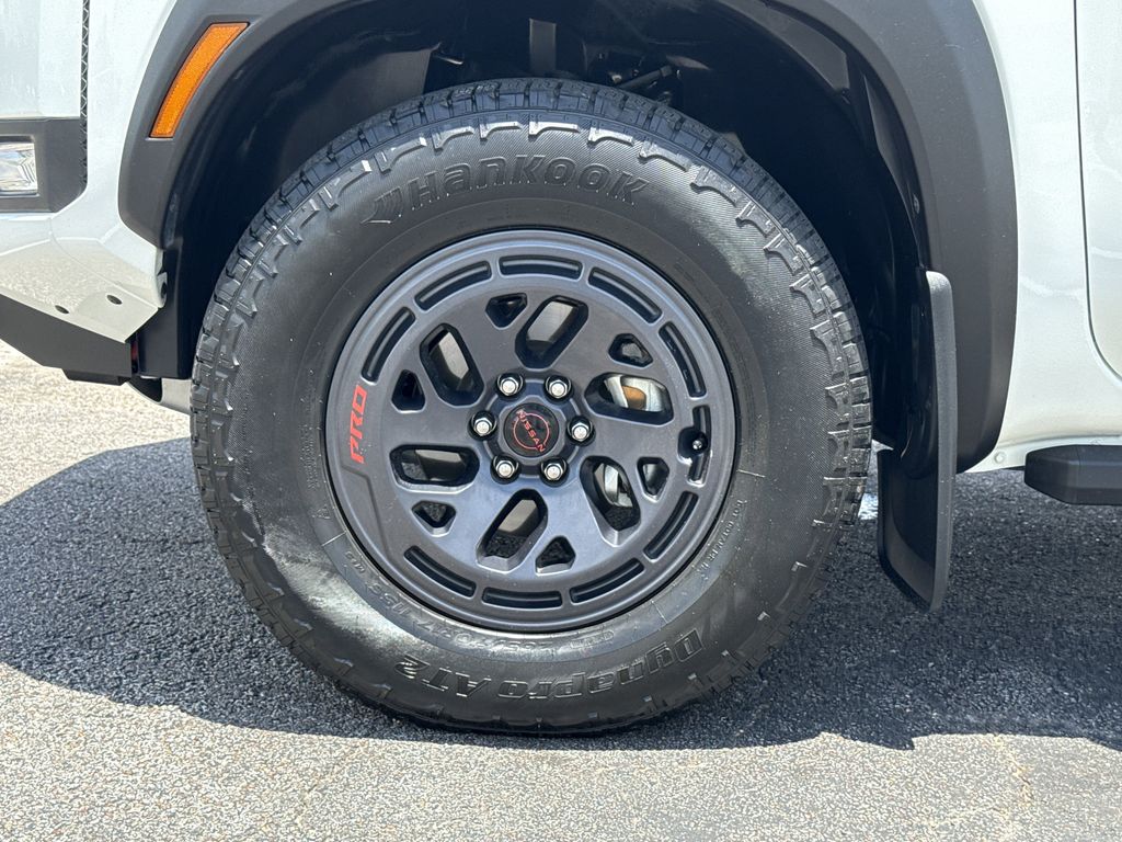 2025 Nissan Frontier PRO-4X White at Central Houston Nissan