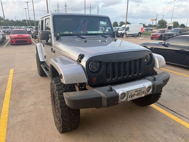 2013 Jeep Wrangler Unlimited Sahara Silver at Emmons Autoplex