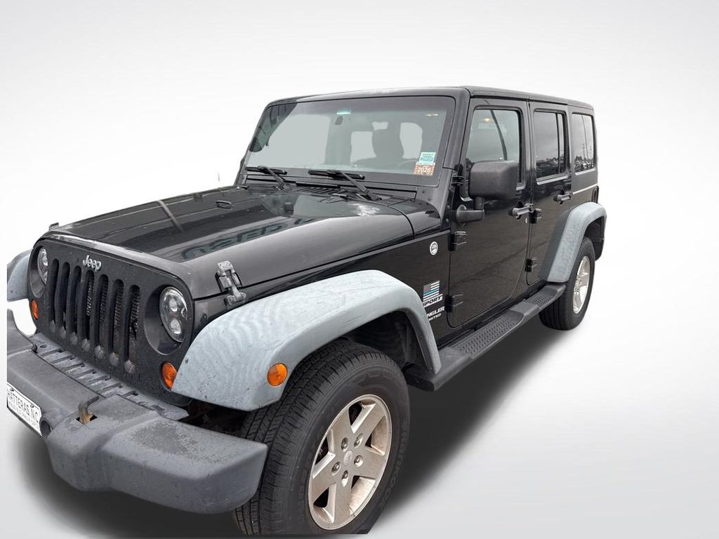Used 2012 Black Jeep Unlimited Sport image 8