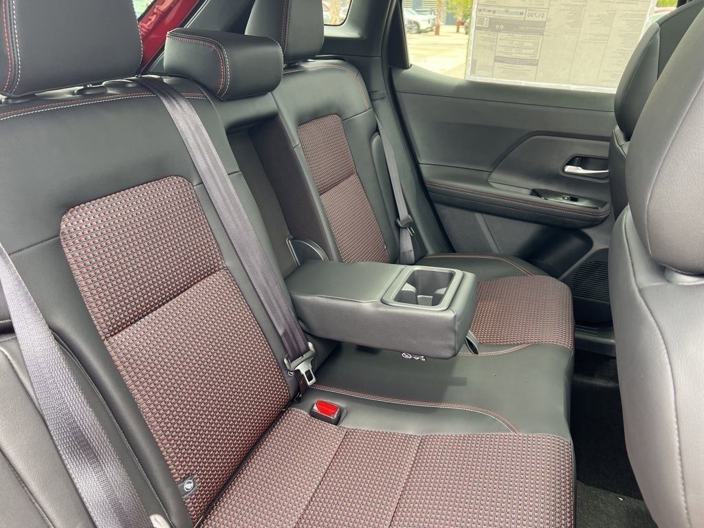 2025 Scarlet Ember Tintcoat Nissan Kicks SR FWD SUV