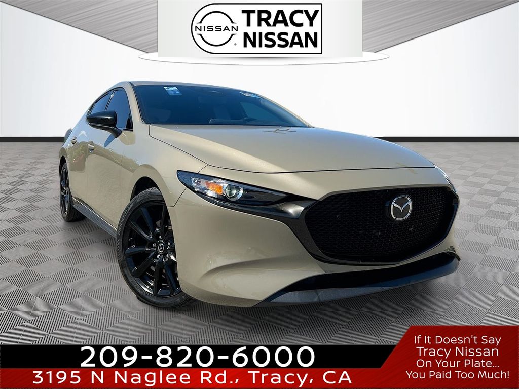 Zircon Sand Metallic 2024 Mazda MAZDA3 2.5 S Carbon Turbo Hatchback AWD Hatchback All-Wheel Drive 6-Speed Automatic