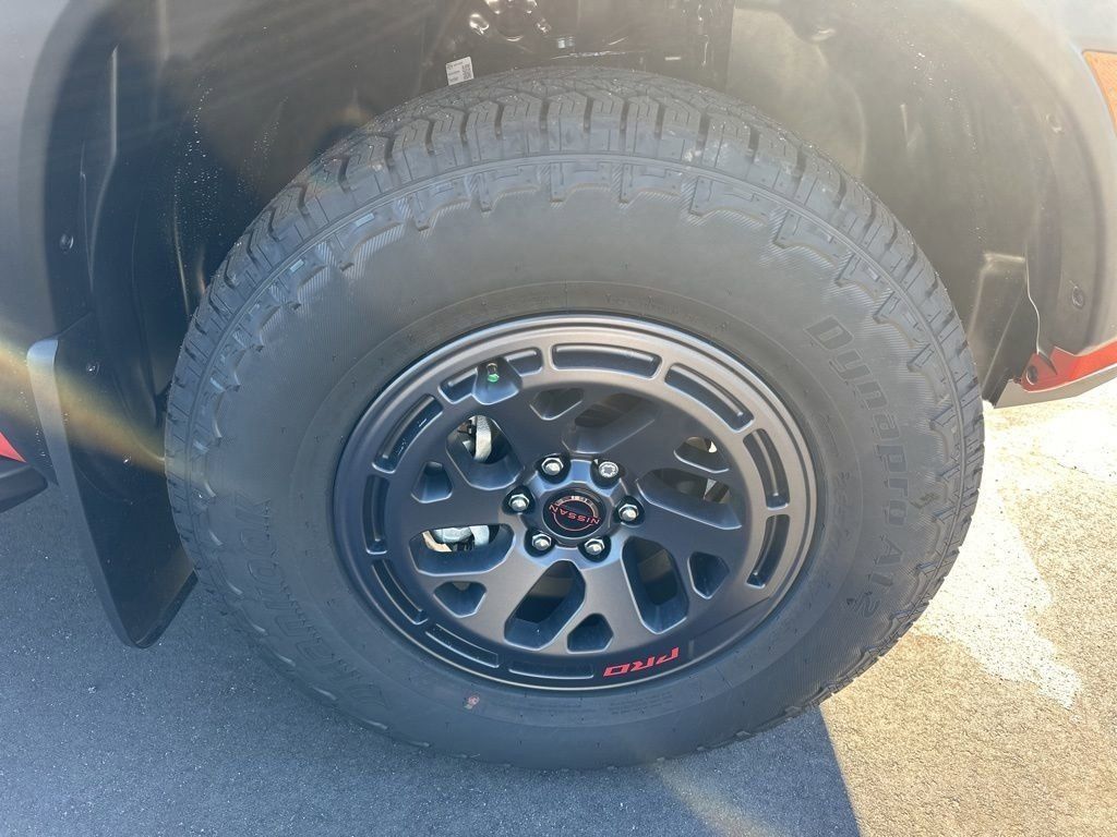 2025 Afterburn Orange Nissan Frontier PRO-4X 4X4 Truck