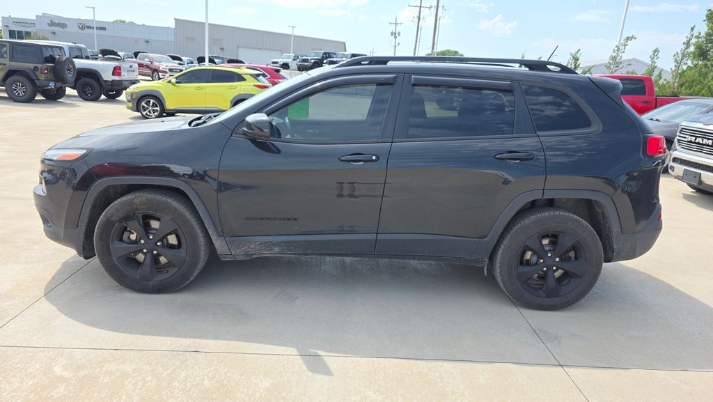 Used 2015 Jeep Cherokee Altitude with VIN 1C4PJMCS0FW792656 for sale in Kansas City