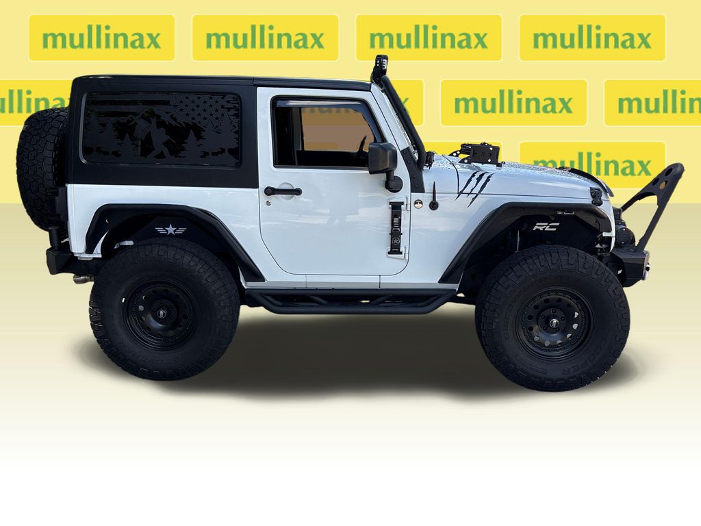 Used 2016 Jeep Wrangler Black Bear with VIN 1C4AJWAG5GL103102 for sale in New Smyrna Beach, FL