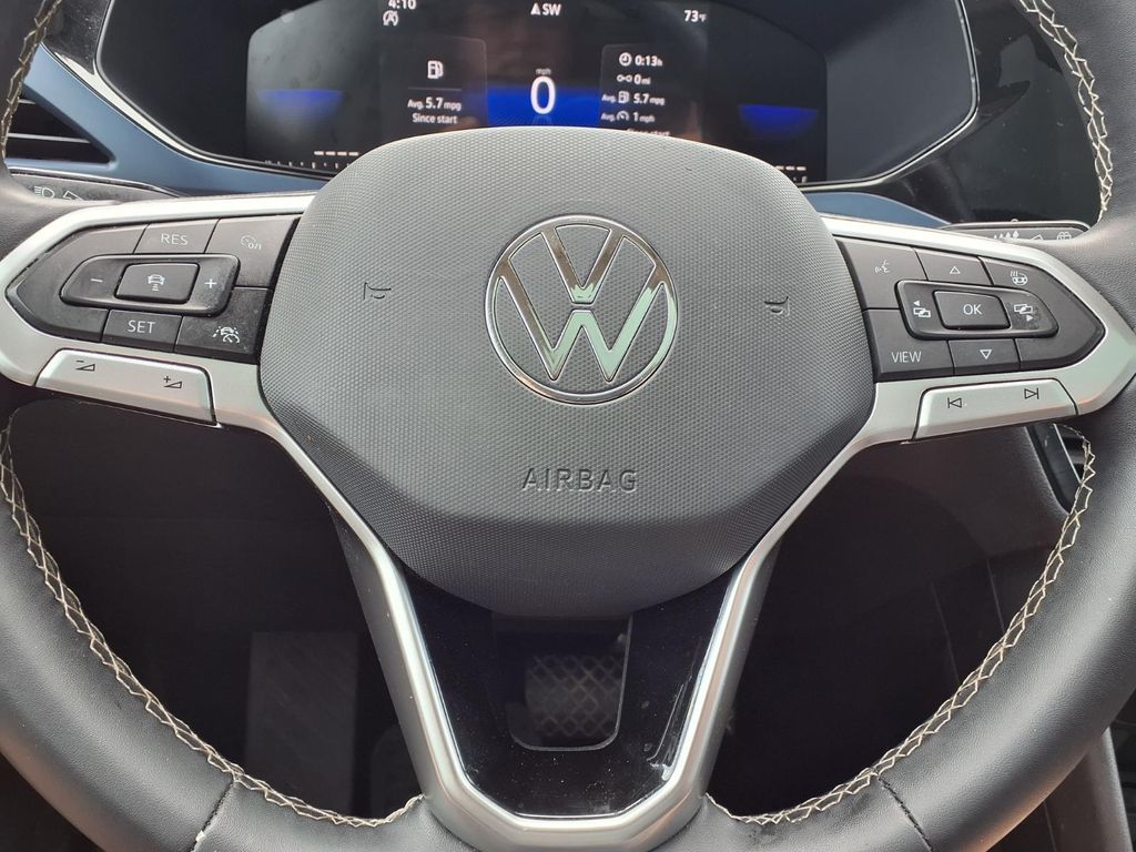 2023 Volkswagen Taos 1.5T SE White at DeMontrond Auto Country