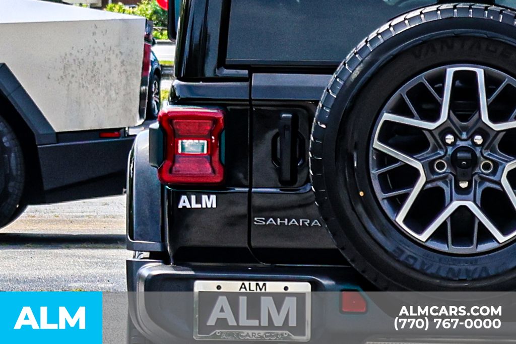 Used 2025 Black Jeep Sahara / MT Certified image 13