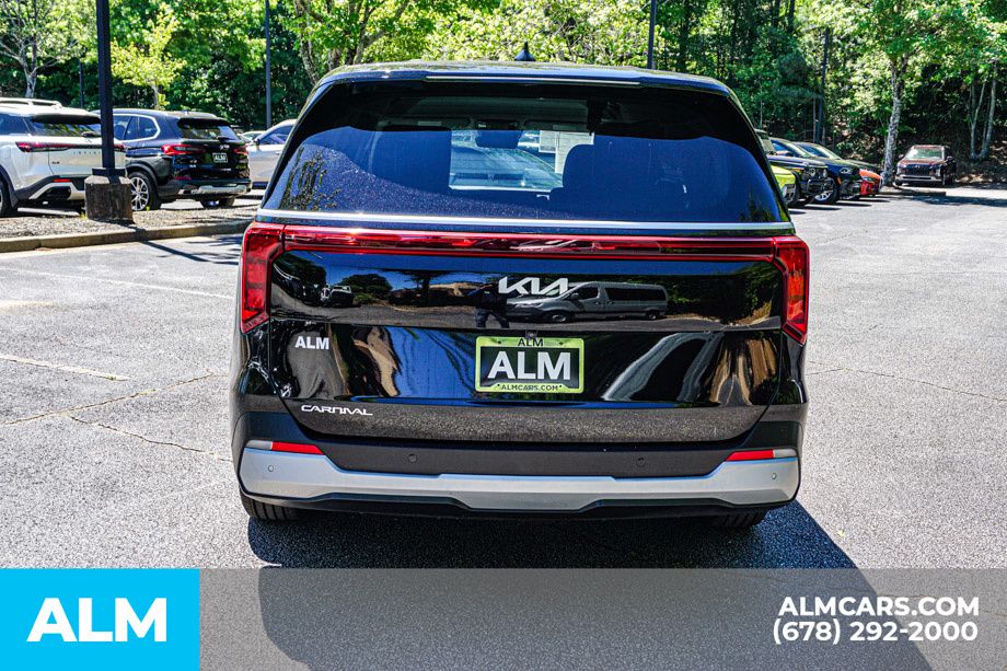 Used 2025 Black Kia LXS image 11
