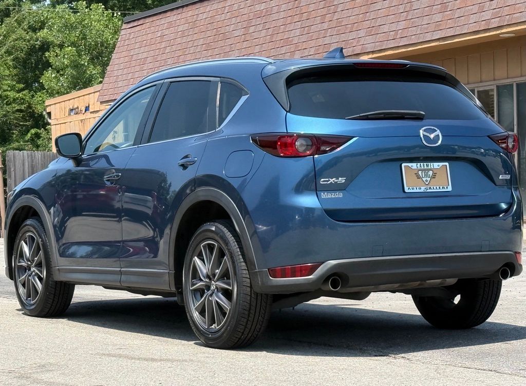 View vehicle photo 3