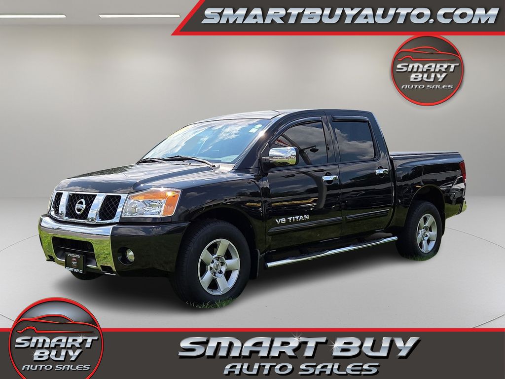 Black 2005 Nissan Titan Pickup Truck Four-Wheel Drive 5-Speed Automatic