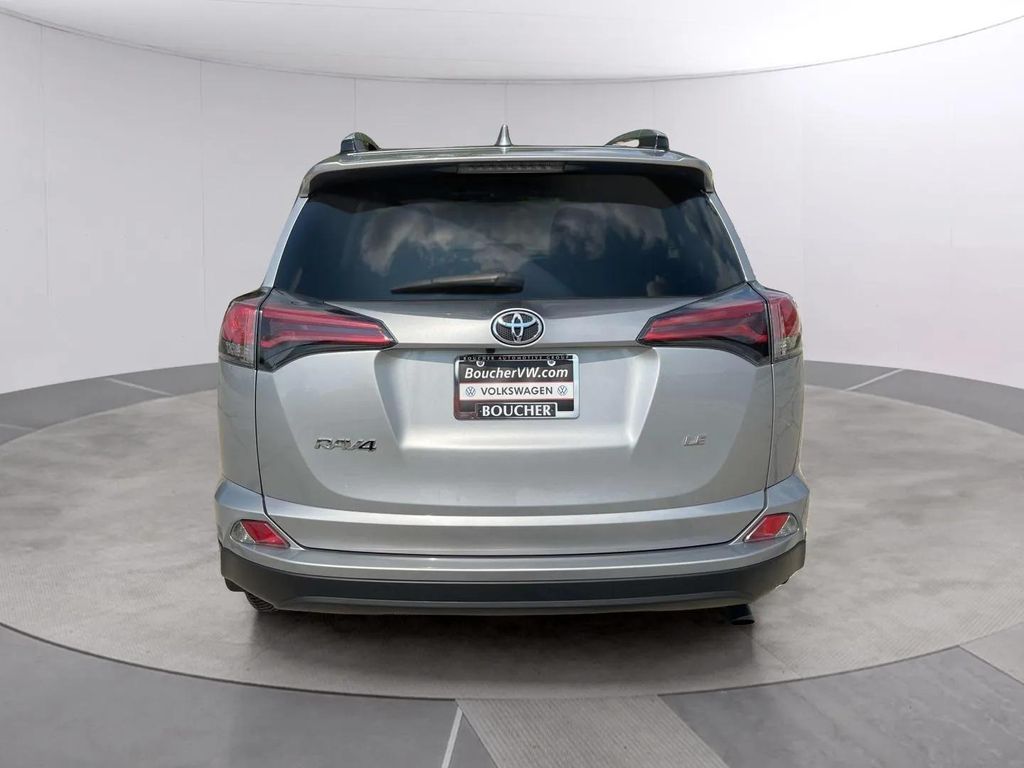 Used 2018 Silver Sky Metallic Toyota LE image 4
