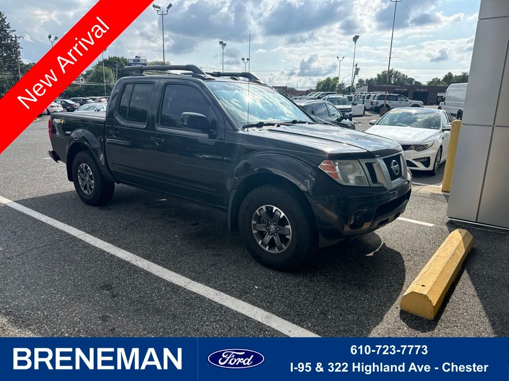 Gray (Magnetic Black) 2016 Nissan Frontier Pickup Truck Four-Wheel Drive 5-Speed Automatic Overdrive