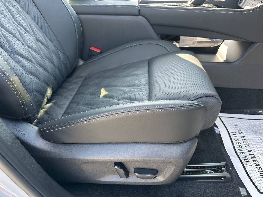 2025 Boulder Gray Pearl/Super Black Nissan Rogue Platinum FWD SUV