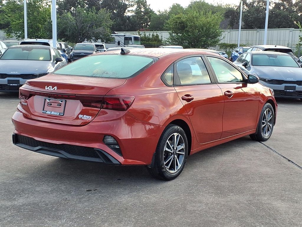 2023 Kia Forte LXS Red at Shottenkirk Kia Fort Bend