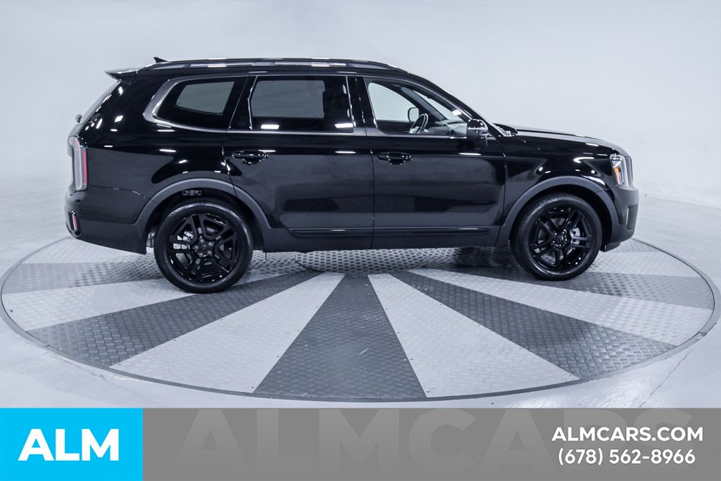 Used 2025 Black Kia EX X-Line image 11