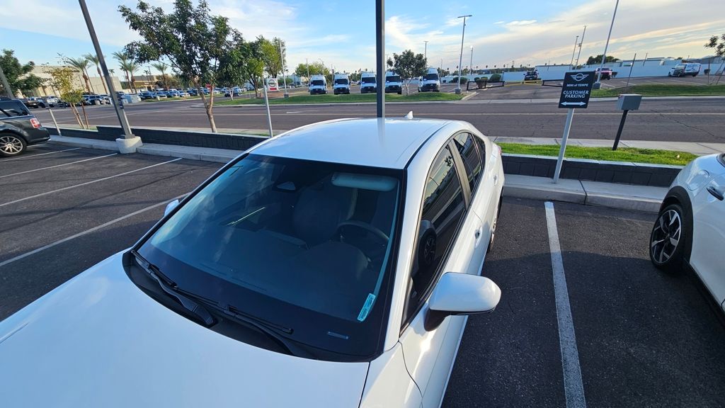 Used 2025 White Toyota LE image 2