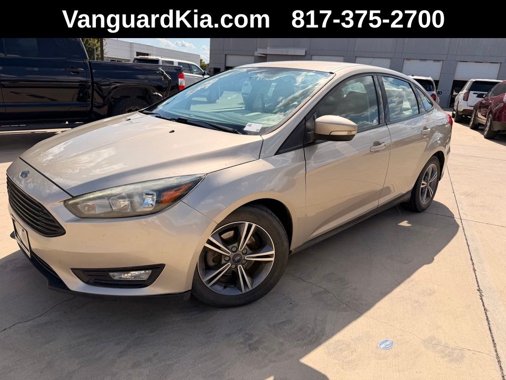 White Gold Metallic 2017 Ford Focus Sedan Front-Wheel Drive 6-Speed Automatic