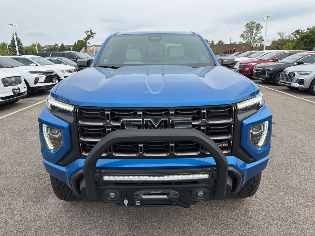 Dynamic Blue Metallic 2023 GMC Canyon AT4X Crew Cab 4WD Pickup Truck Four-Wheel Drive 8-Speed Automatic