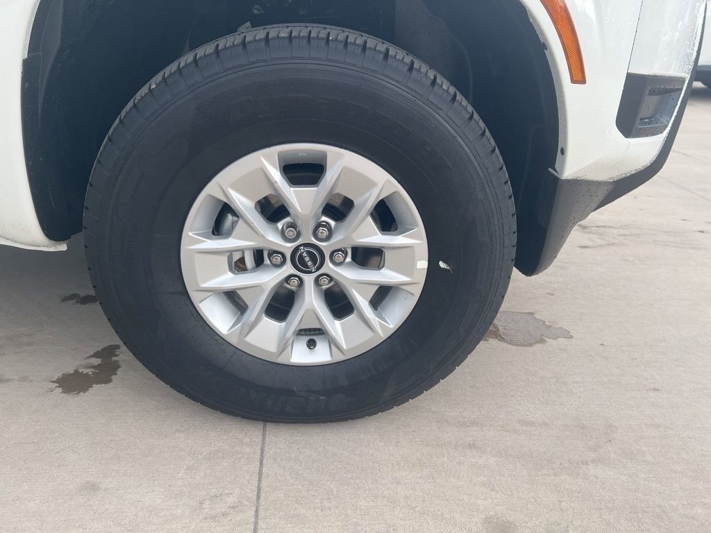 2025 Glacier White Nissan Frontier S 4X4 Truck