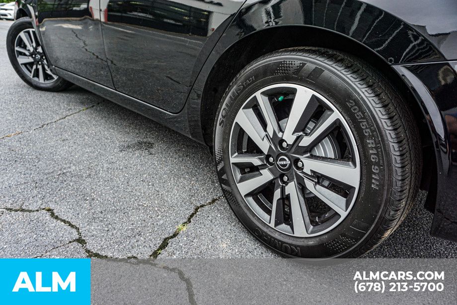 Used 2024 Black Nissan 1.6 SV image 16