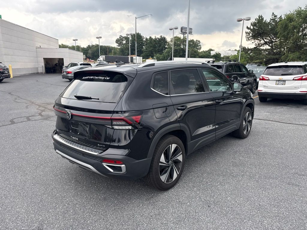 2025 Volkswagen Taos 1.5T SE Black at Sutliff Volkswagen