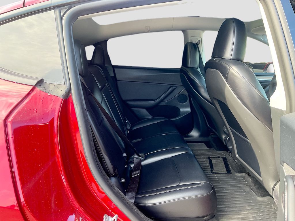 2025 Tesla Model Y Long Range Red at AutoSavvy Houston Northwest