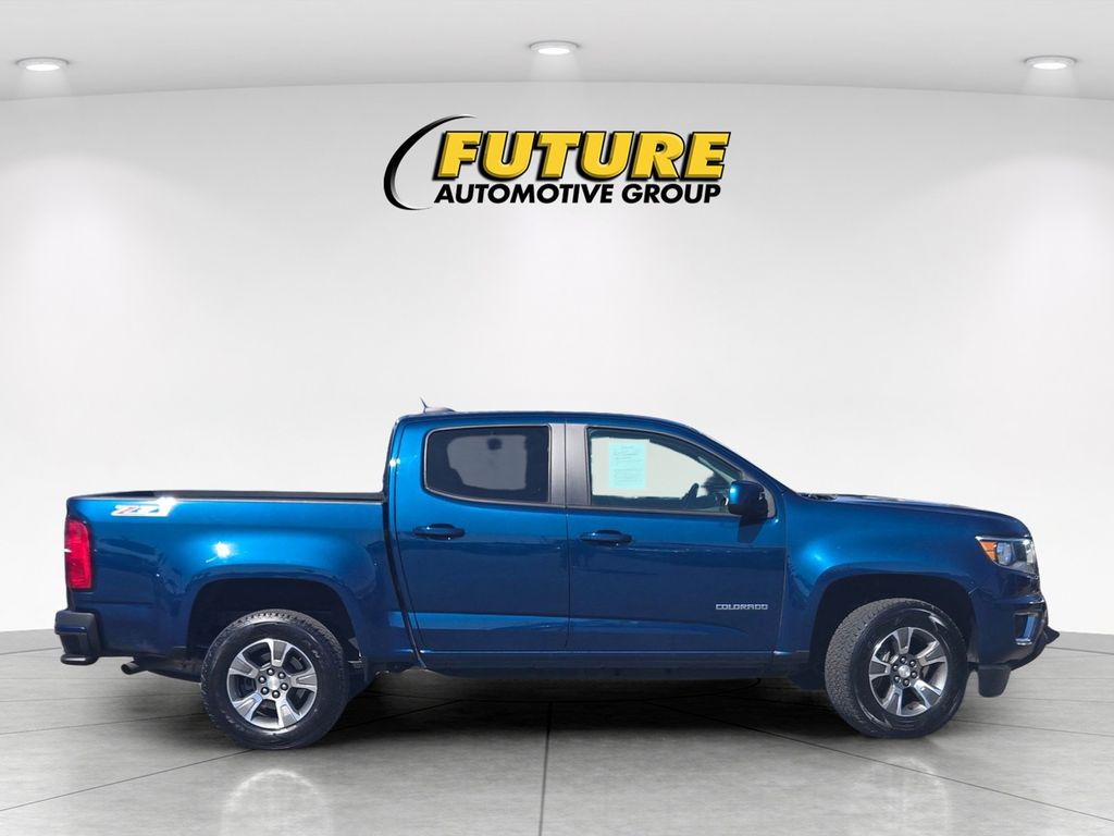 View vehicle photo 3