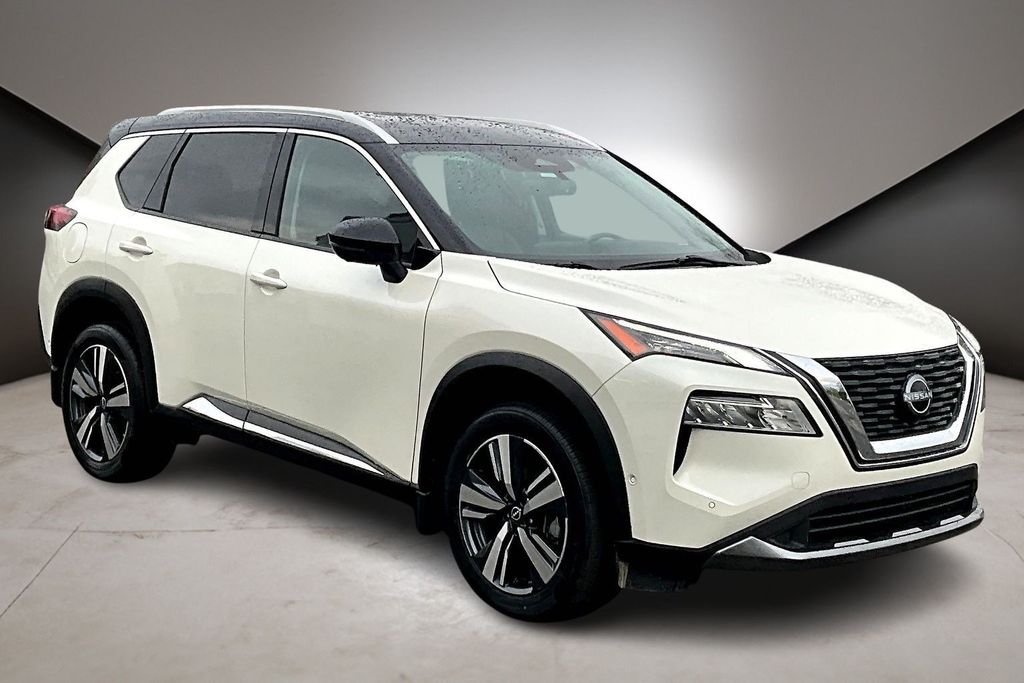 Pearl White Tricoat/Super Black 2023 Nissan Rogue SL AWD SUV / Crossover All-Wheel Drive Continuously Variable Transmission