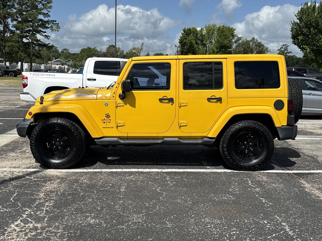 2015 Jeep Wrangler Unlimited Sahara Yellow at Parkway Family Mazda