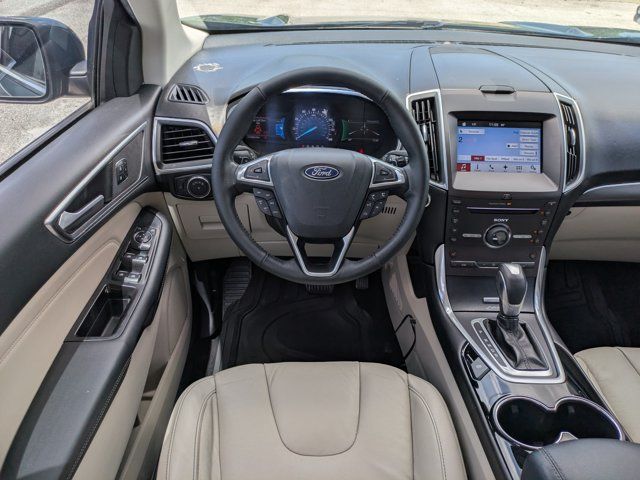 Used 2016 Blue Metallic Ford Titanium image 15