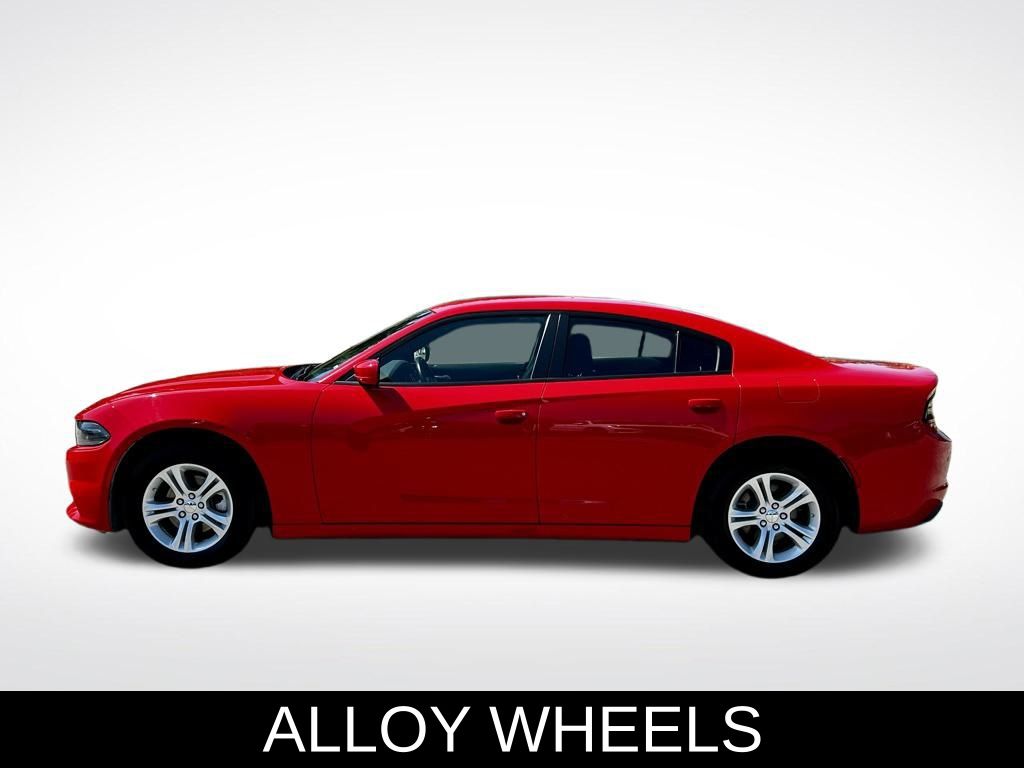 Used 2022 Dodge Charger SXT with VIN 2C3CDXBG2NH261593 for sale in Miami, FL