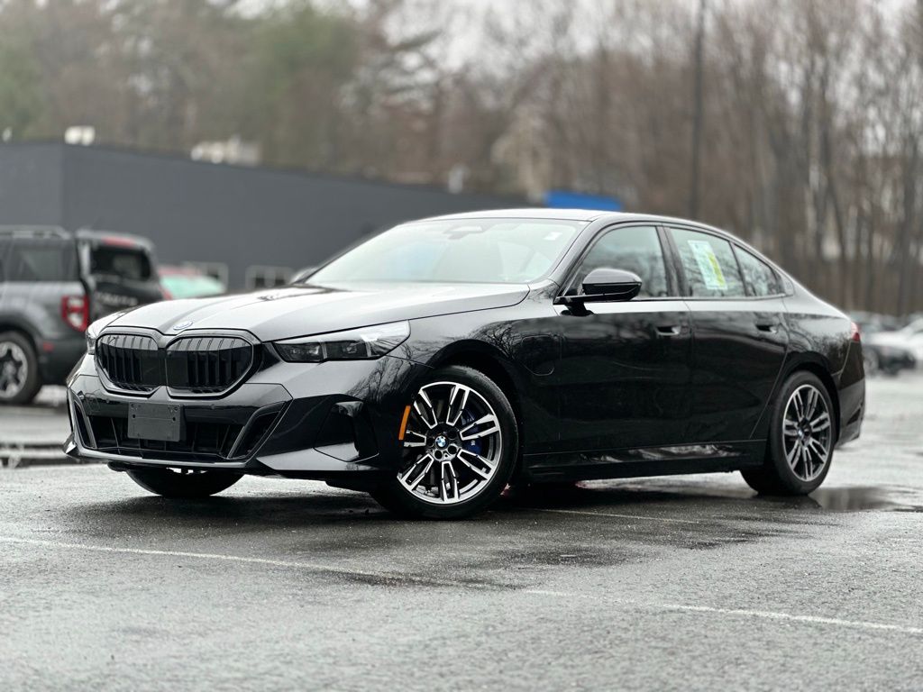 Black Sapphire Metallic 2026 BMW 5 Series 550e xDrive Sedan All-Wheel Drive 8-Speed Automatic