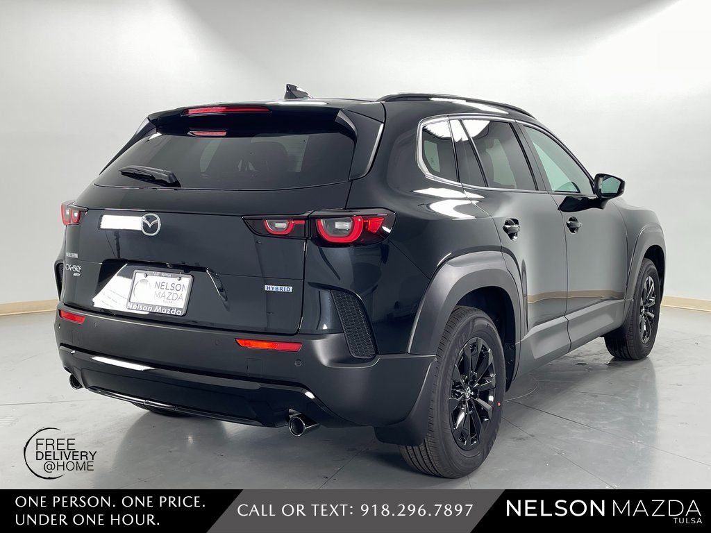 New 2026 Black Mazda Premium image 6