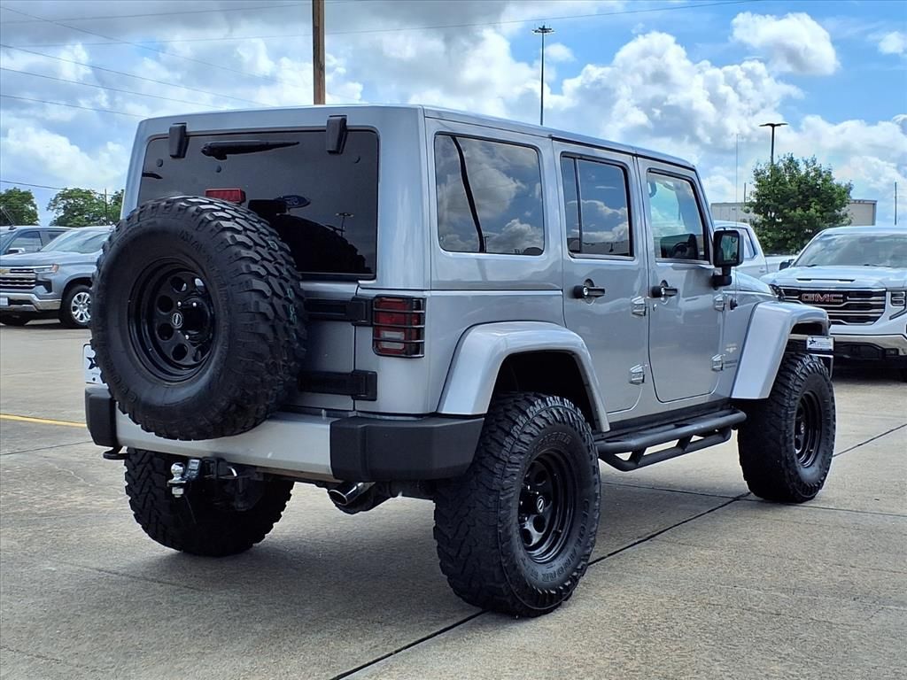 2013 Jeep Wrangler Unlimited Sahara Silver at Emmons Autoplex