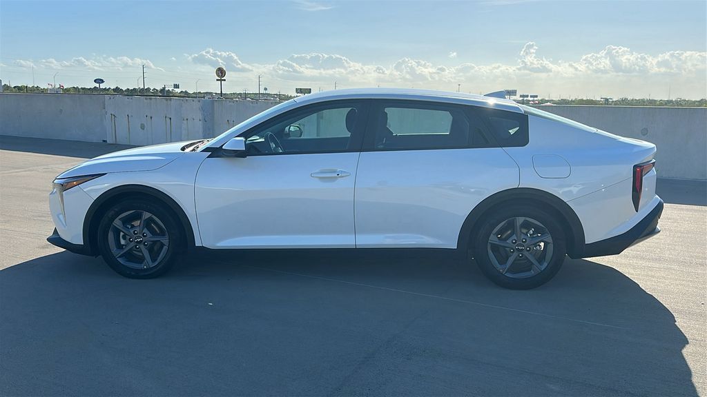 2025 Kia K4 LXS White at Shottenkirk Kia Fort Bend