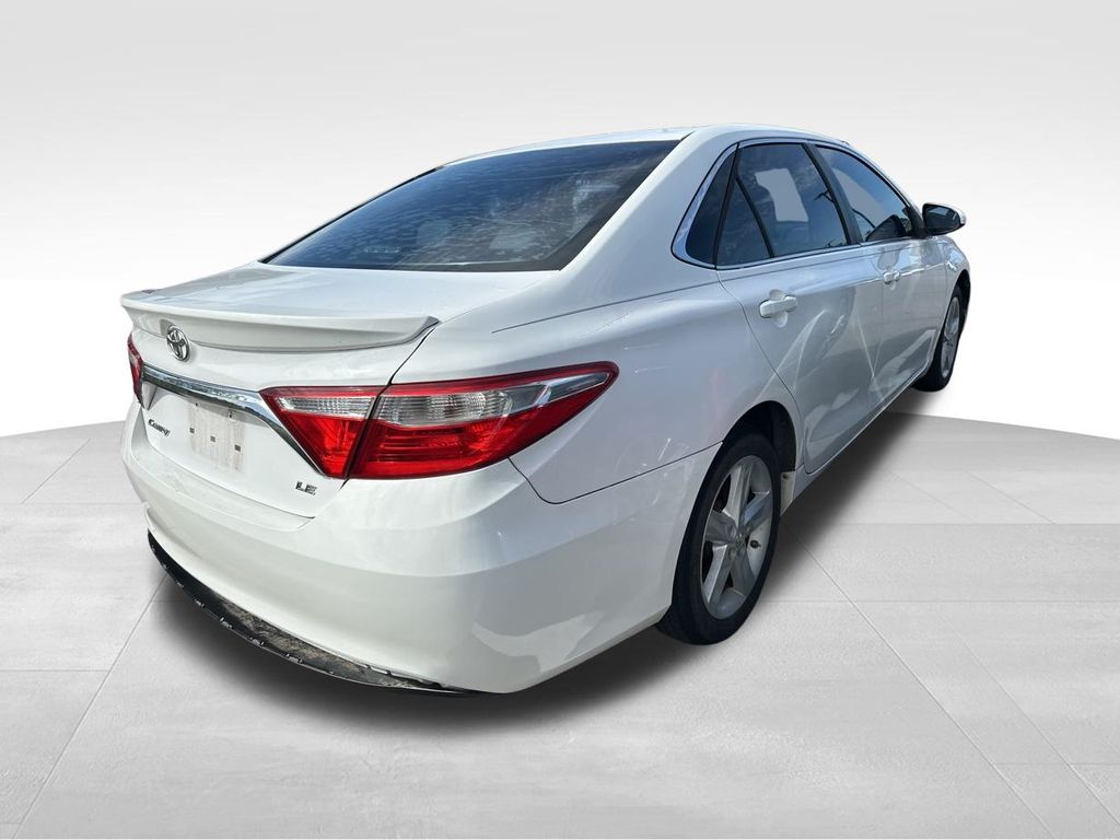 2015 White Toyota Camry LE FWD Sedan
