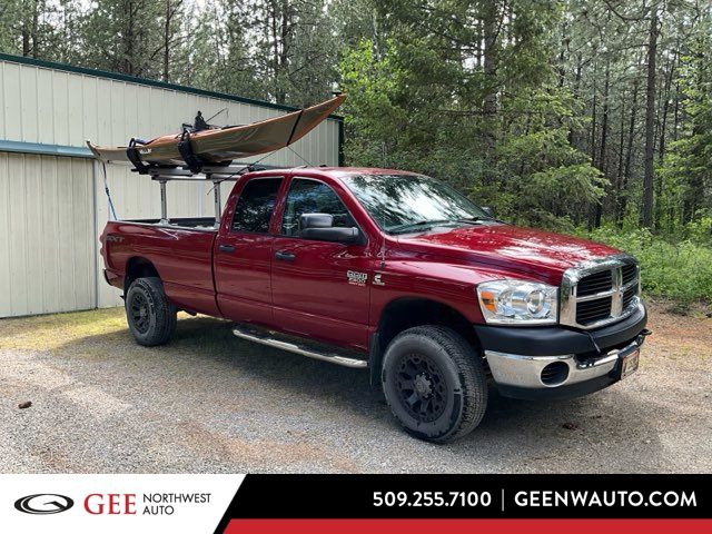 Inferno Red Crystal PC/Mineral Gray Met CC 2009 Dodge RAM 2500 ST Quad Cab 4WD Pickup Truck Four-Wheel Drive 6-Speed Manual