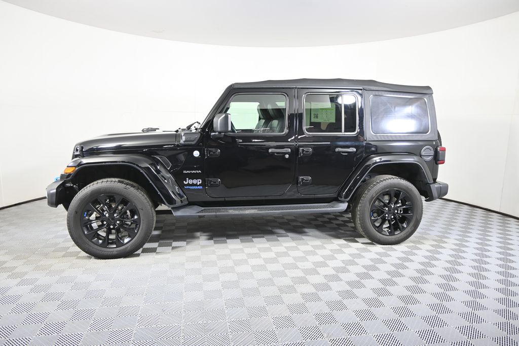 Used 2022 Jeep Wrangler Unlimited Sahara 4XE with VIN 1C4JJXP68NW101621 for sale in Forest Lake, Minnesota