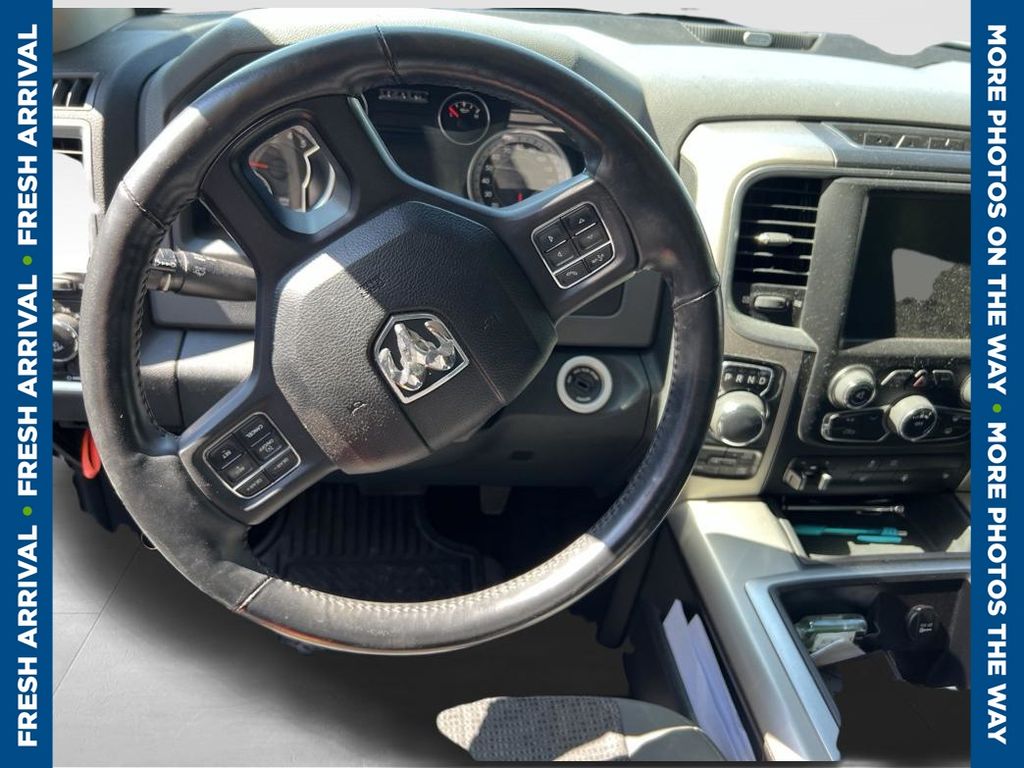 Bright Silver Clearcoat Metallic 2015 RAM 1500 Pickup Truck Four-Wheel Drive 8-Speed Automatic