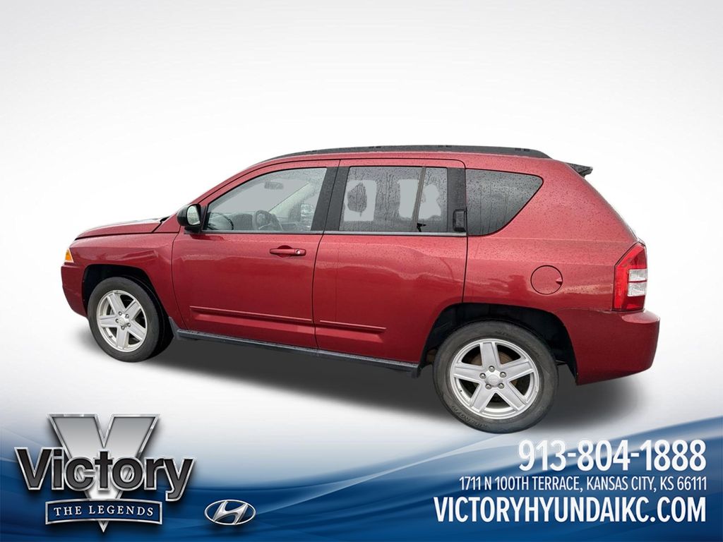 Used 2010 Red Jeep Sport image 8