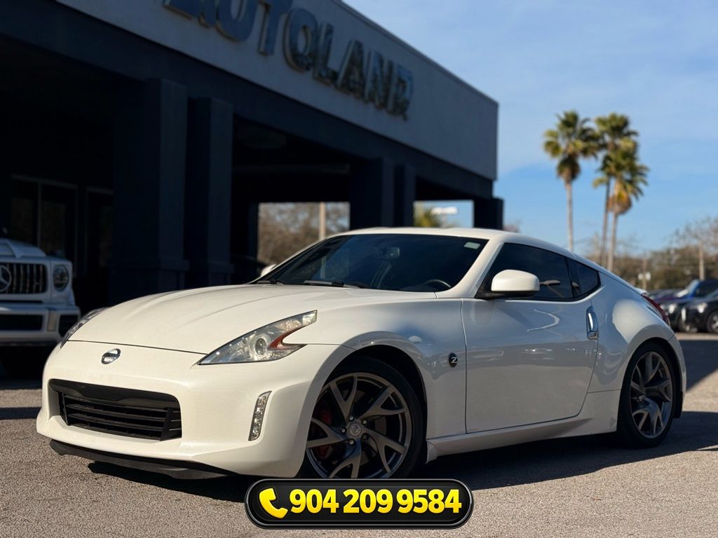 Pearl White Metallic 2013 Nissan 370Z Touring Coupe Rear-Wheel Drive 6-Speed Manual