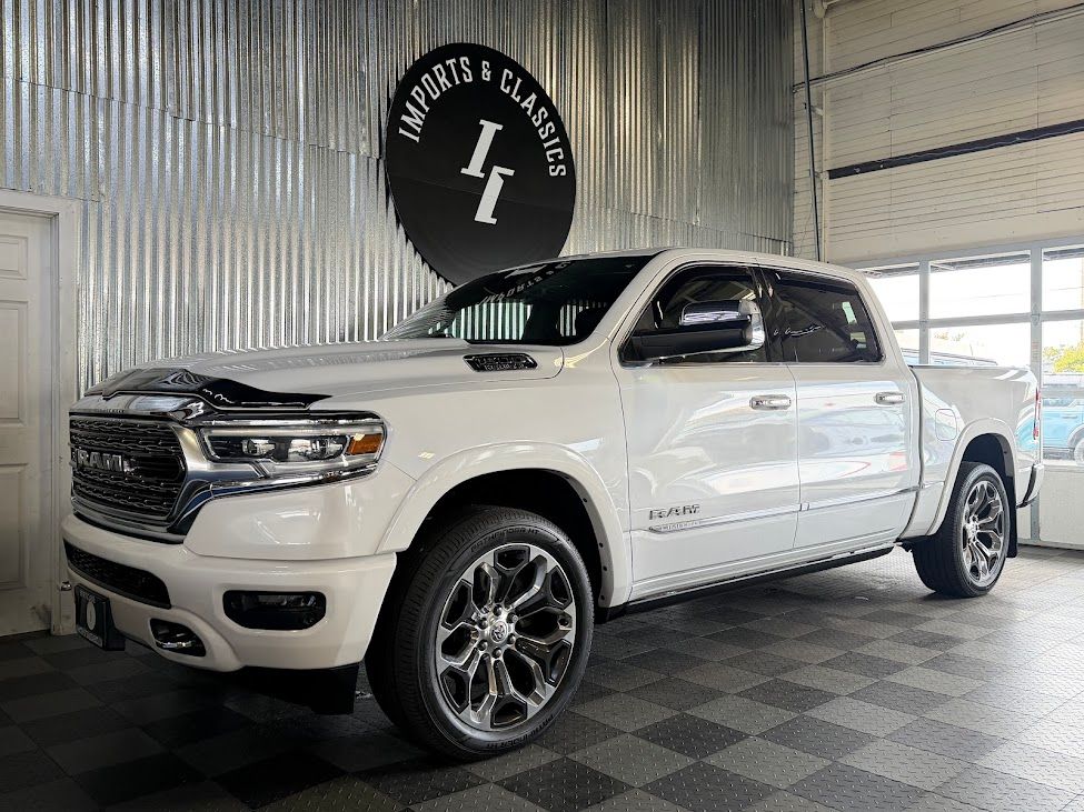 Ivory White Tri-Coat Pearlcoat 2019 RAM 1500 Pickup Truck Four-Wheel Drive 8-Speed Automatic