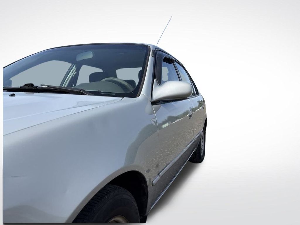 2000 Silver Stream Opal Toyota Corolla LE FWD Sedan