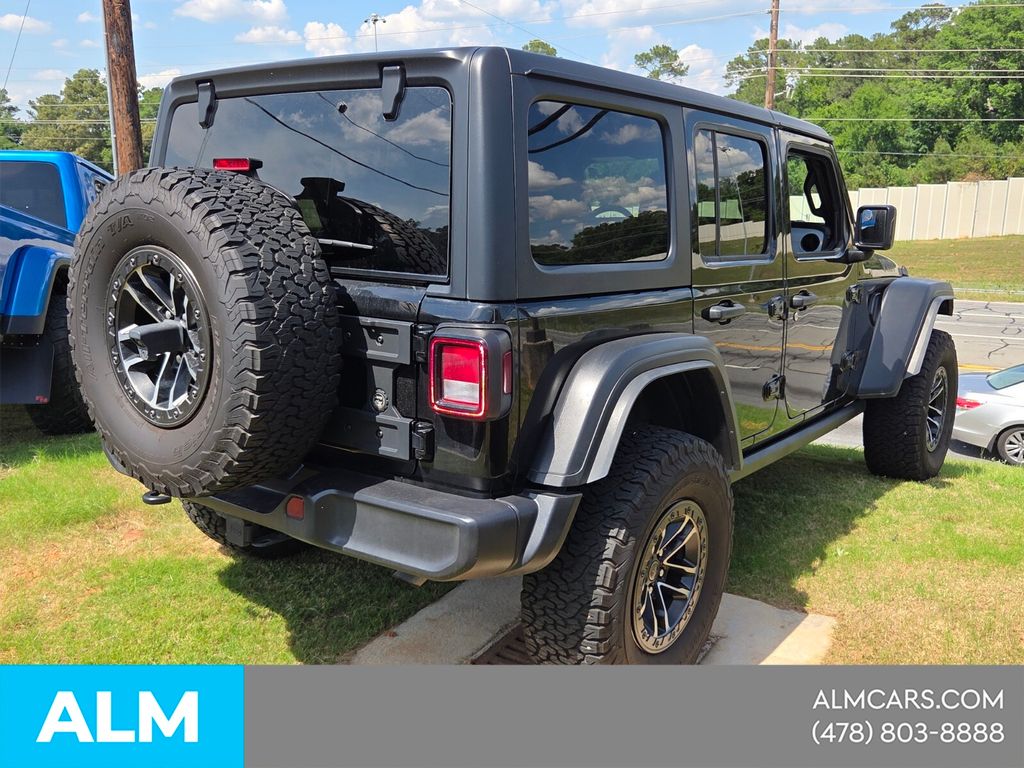 Used 2024 Black Jeep Sport image 7