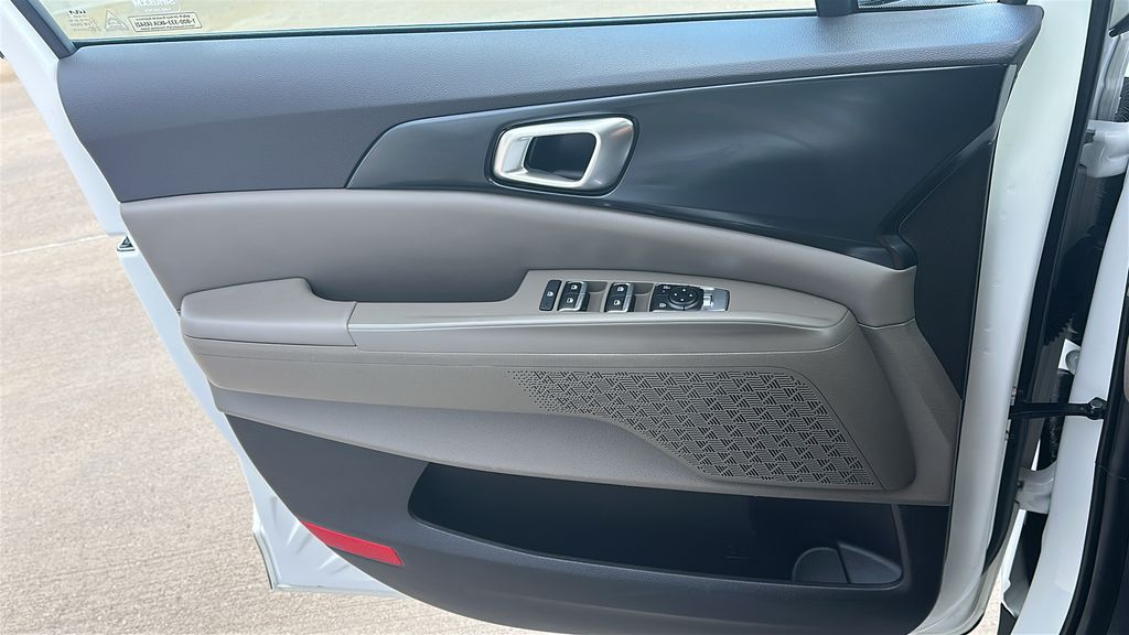 2026 Kia Carnival LXS White at DeMontrond Automotive Group